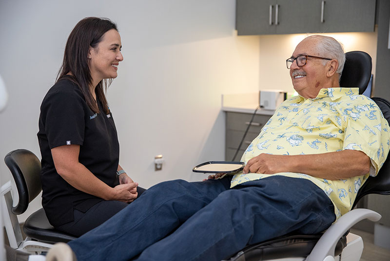 dental patient smilng Soft Tissue Treatment