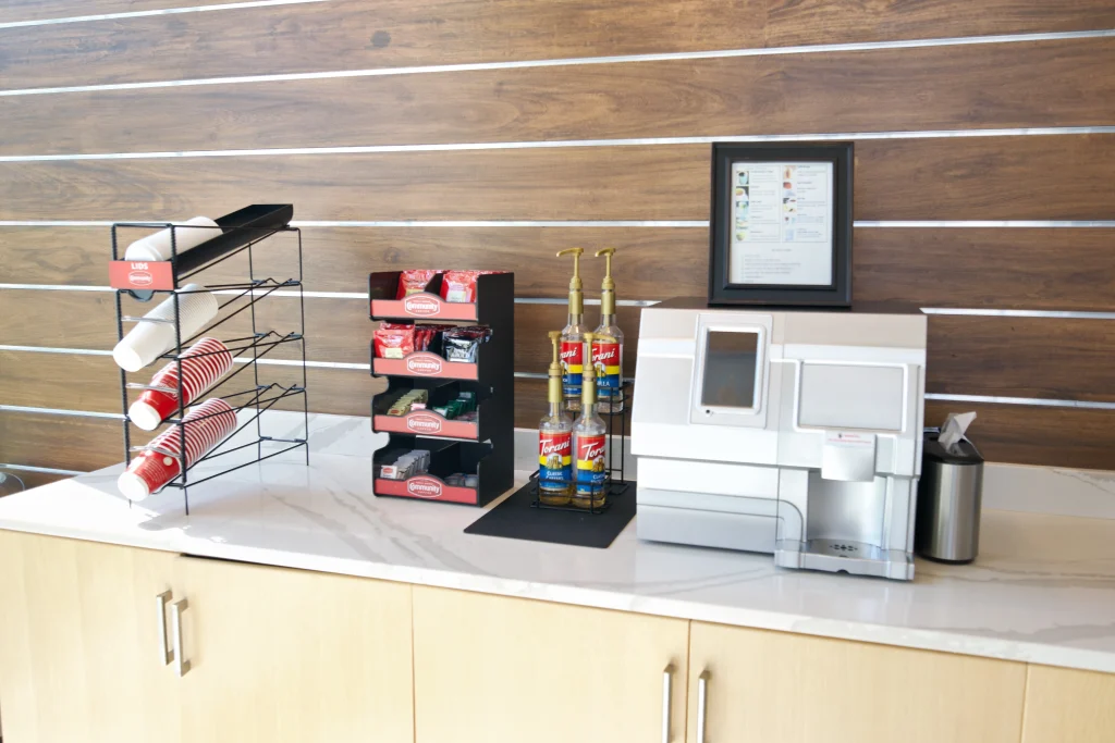 Coffee station with snacks for patients and families at Pearl Dental Group
